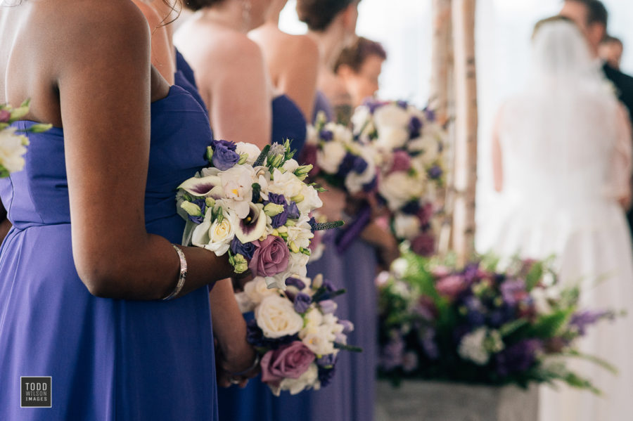 purple and white bridesmaids bouquet