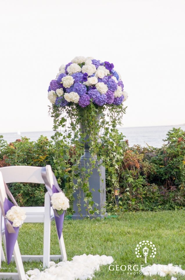 Tall purple and white wedding ceremony floral arrangements by Stapleton Floral Design