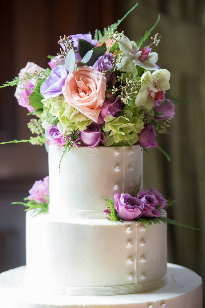 white wedding bouquet with colorful florals by Stapleton Floral Design