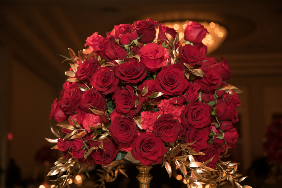 red roses with gold leaves by Stapleton Floral Design