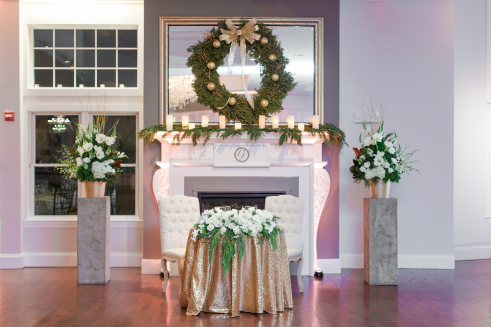 Holiday wreath gold and creme at a wedding