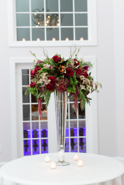 Tall wedding centerpieces with red roses by Stapleton Floral Design