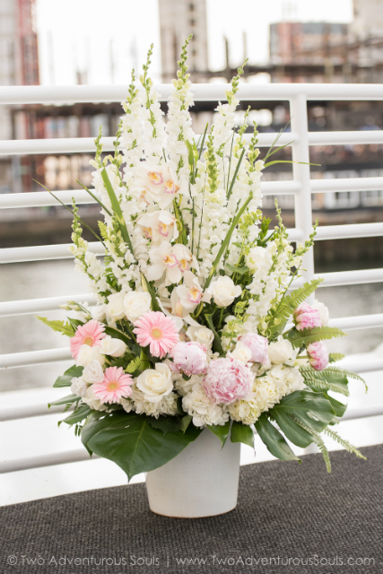 Pink and cream wedding ceremony centerpiece