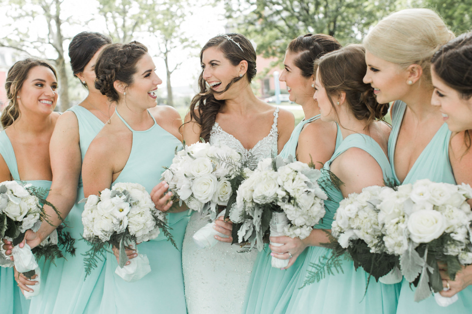 bride and bridesmaids wearing mint color dresses