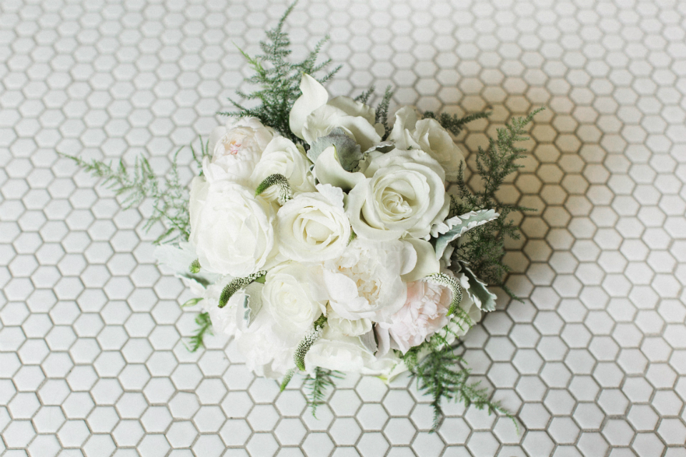 white and cream roses bridal bouquet with greenery by Stapleton Floral Design