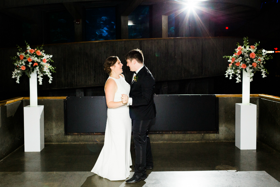 Bride and groom dancing at their New England Aquarium wedding