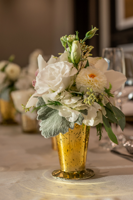 gold mercury glass vessels floral arrangement