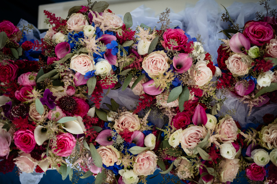 Jewel tone garland with pink and cream roses