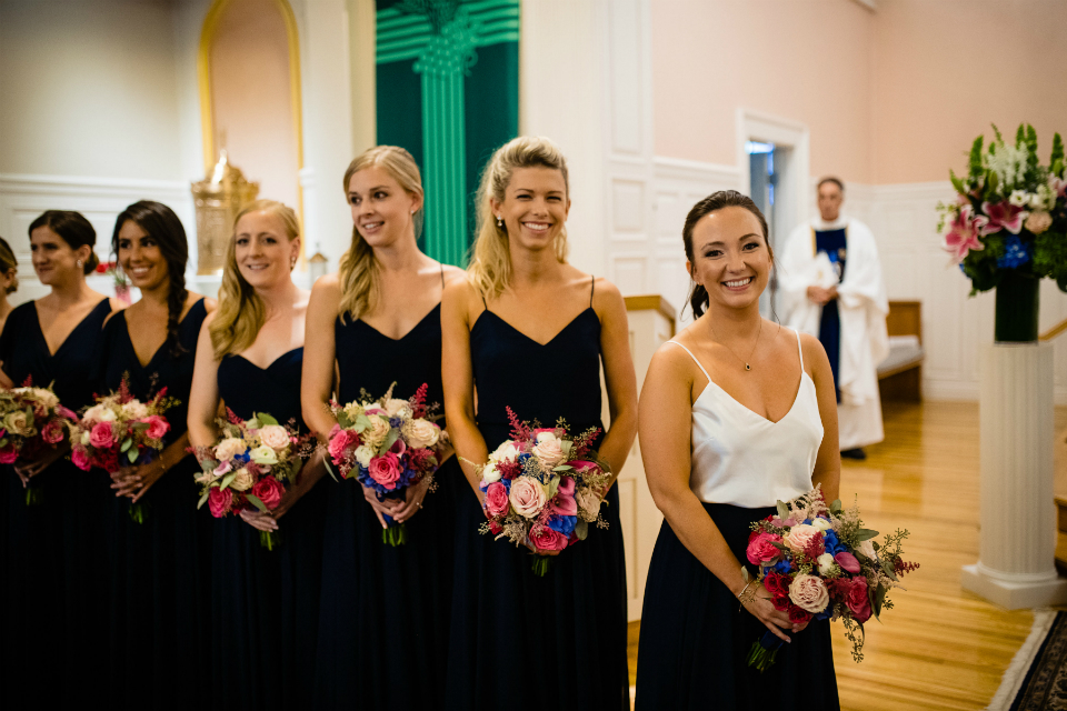 Bridesmaid wearing dark navy dresses