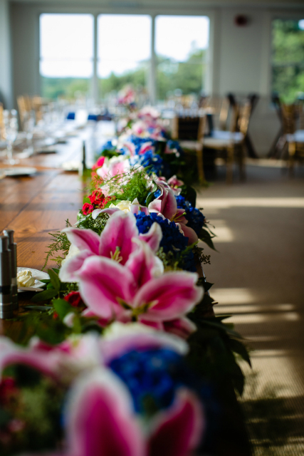 garland of jewel tone flowers