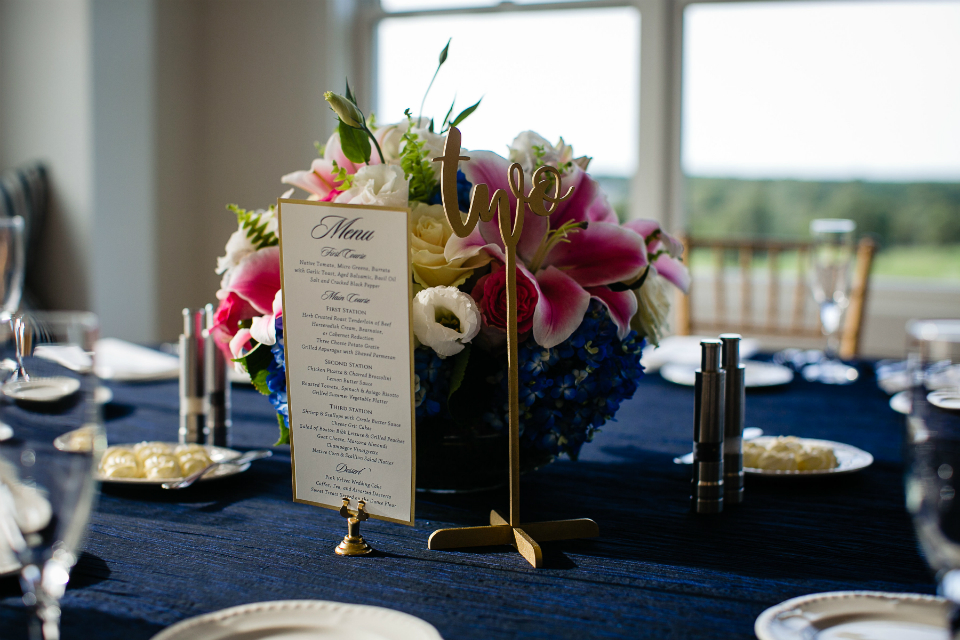 Low jewel tone centerpiece for a wedding