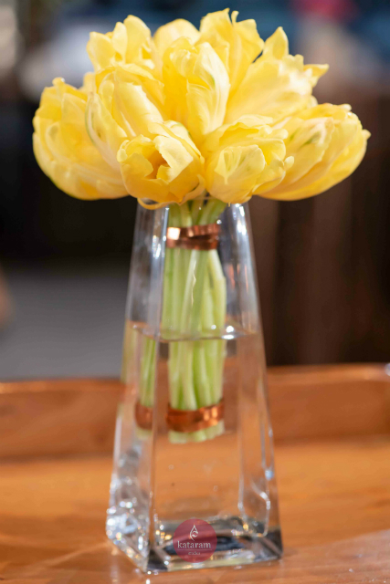 Simple centerpiece with small yellow flowers