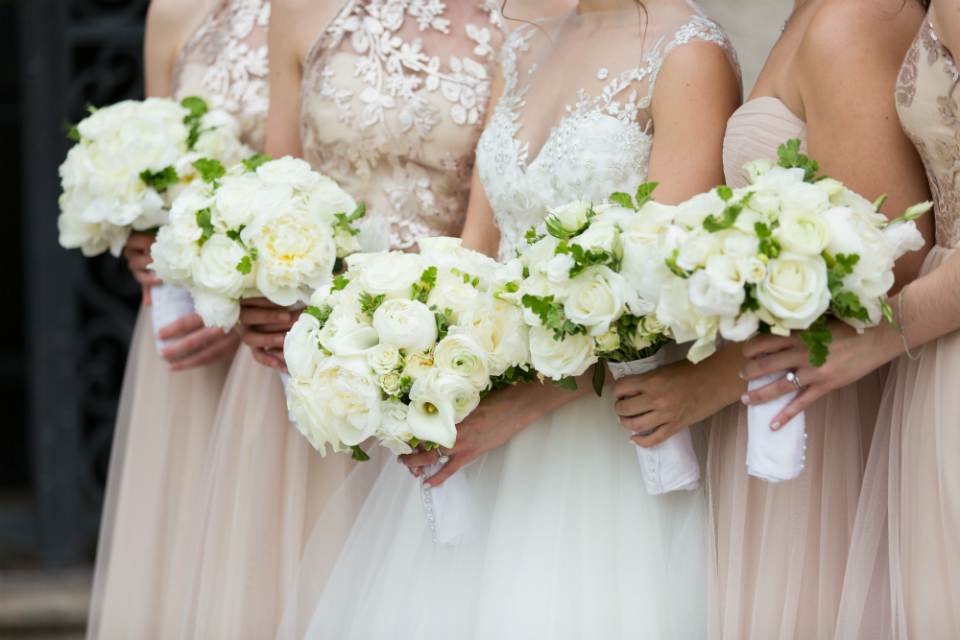 Elegant white roses bridesmaid bouquet by Stapleton Floral Design