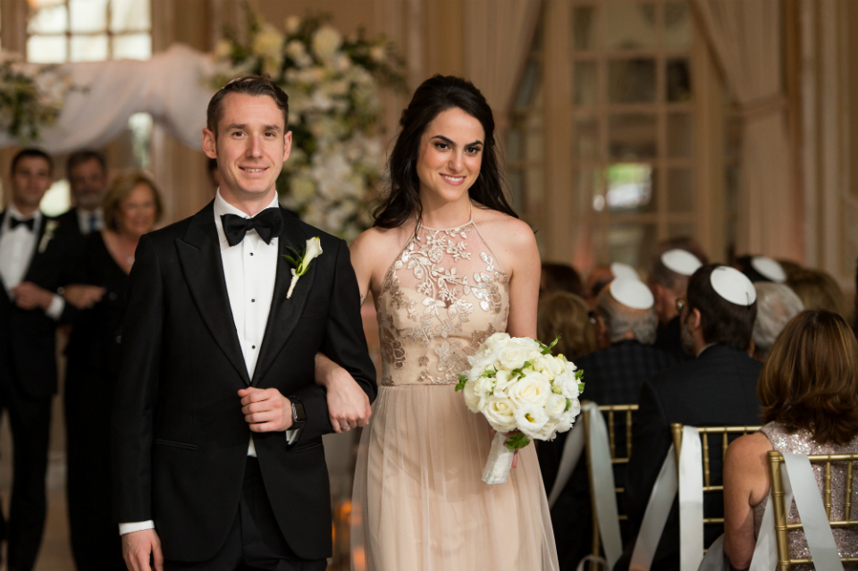 Bridesmaid and Groomsmen walking down the aisle at the Fairmont Copley Plaza