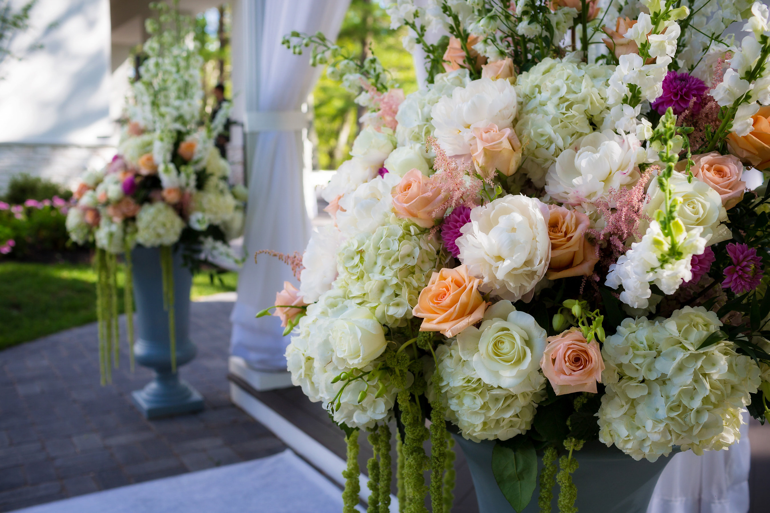 Wedding ceremony flowers designed by Stapleton Floral Design