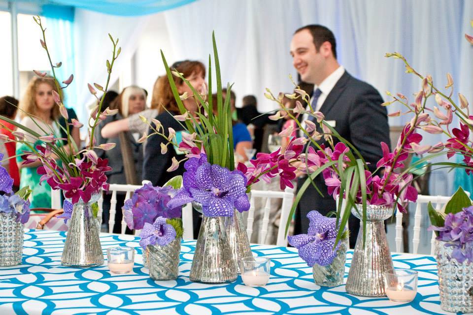 corporate event with purple flowers