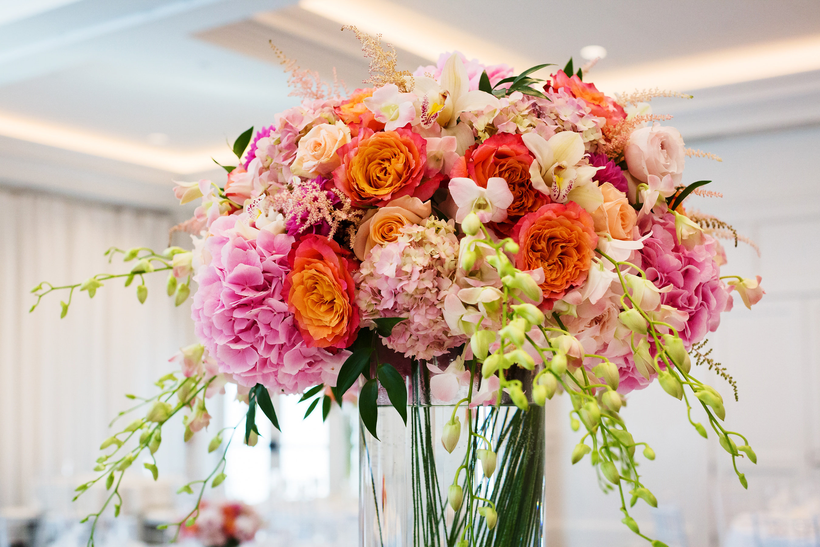 Tall wedding centerpieces with summer colors by Stapleton Floral Design
