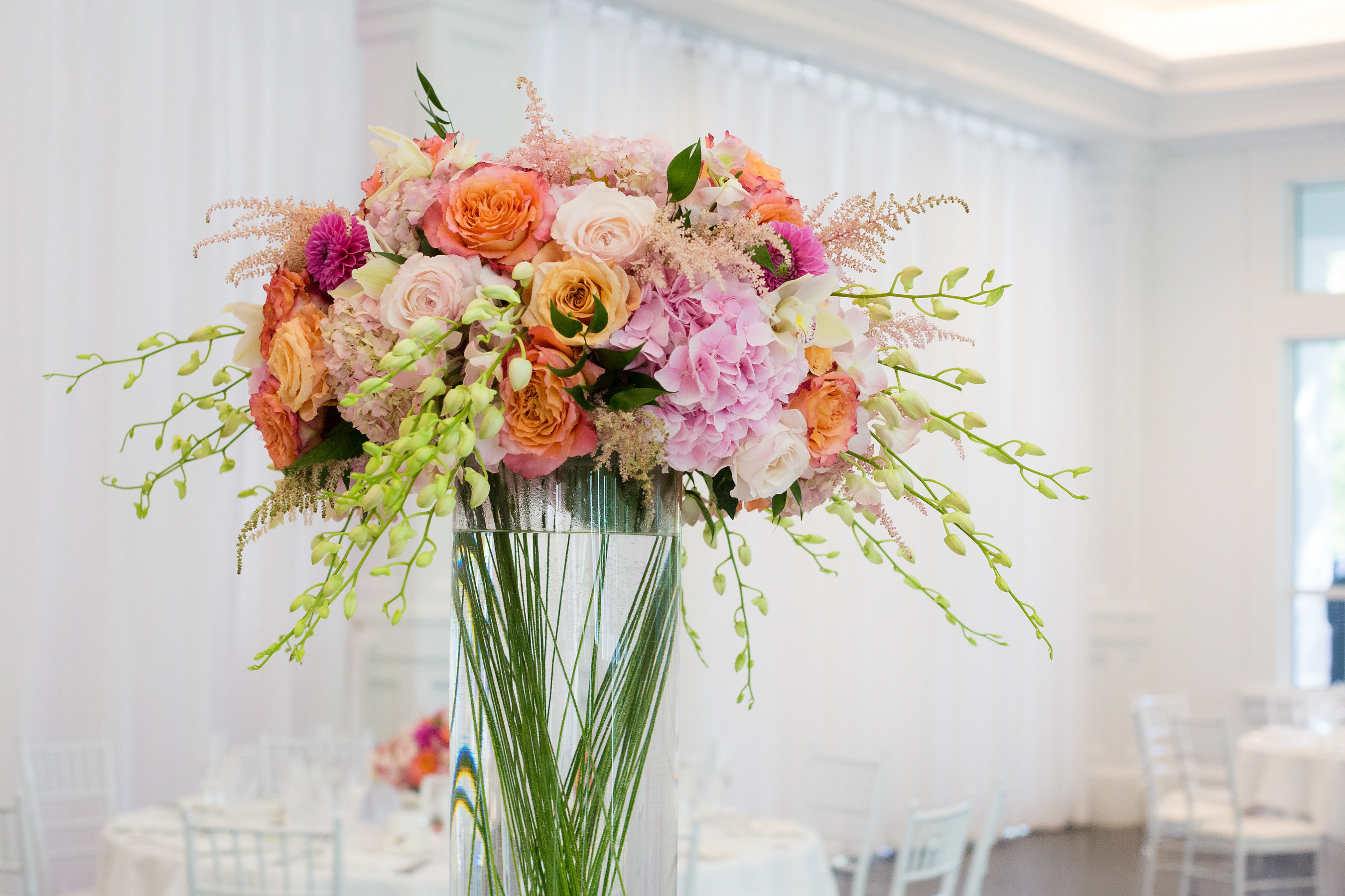 Tall wedding centerpiece with roses by Stapleton Floral Design