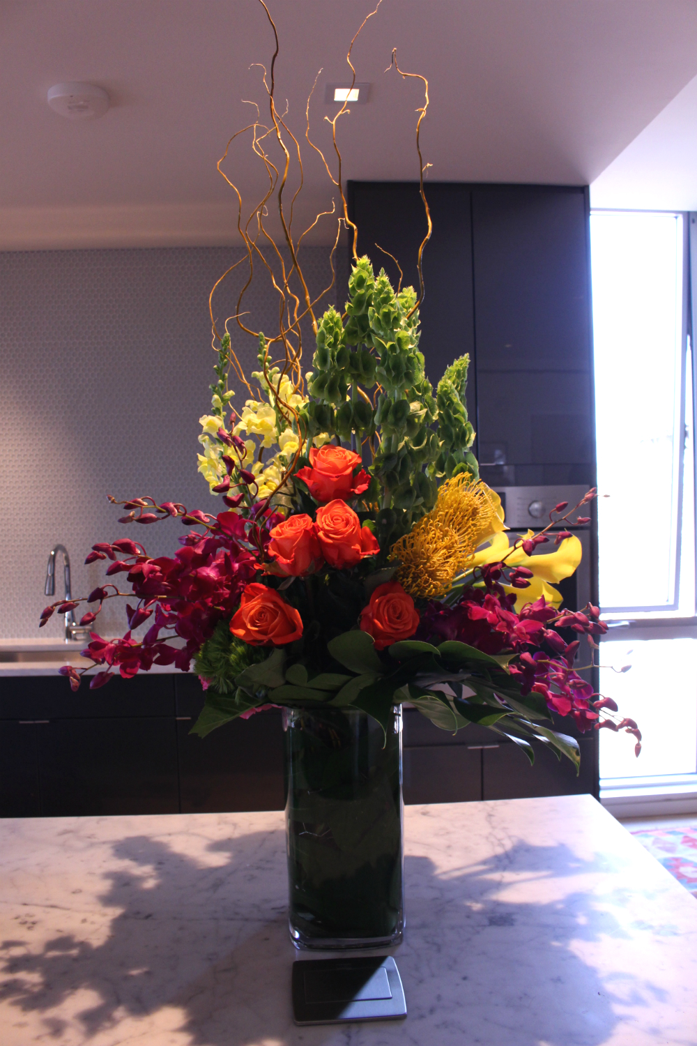 Tall and lush corporate design by Stapleton Floral Design