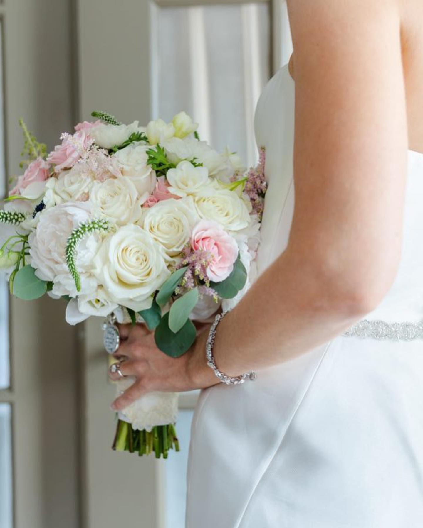 Bride in Wedding Dress Holding Bouquet