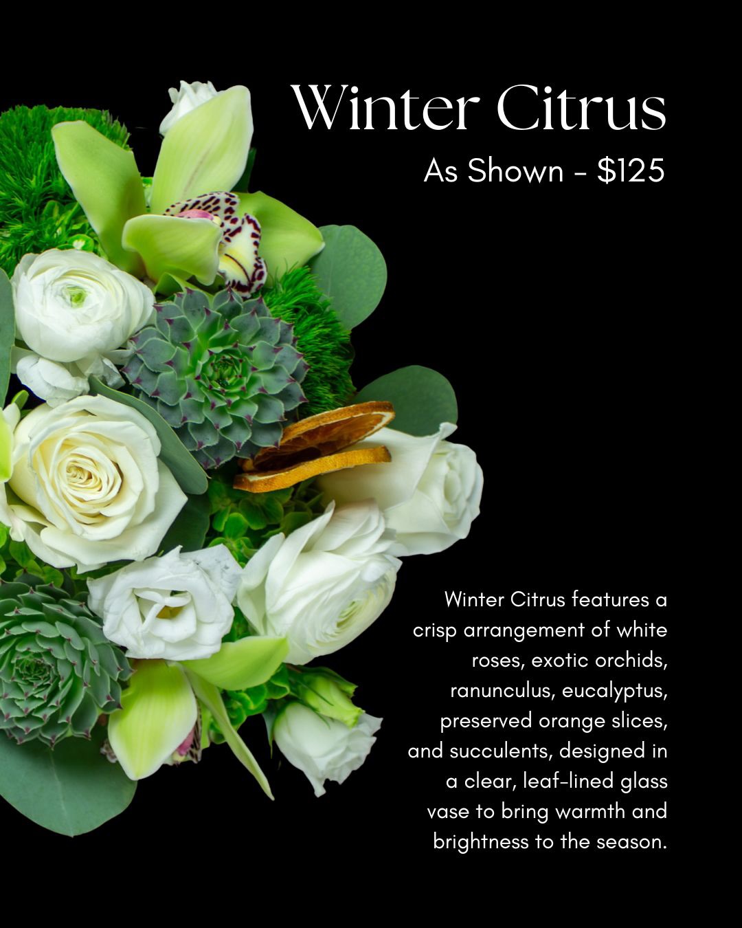 Winter Citrus seasonal floral arrangement featuring white roses, orchids, ranunculus, eucalyptus, succulents, and preserved orange slices in a clear glass vase.